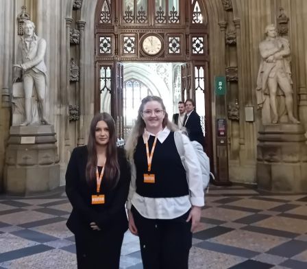 Cecilia and Alyssa standing in the houses of parliament