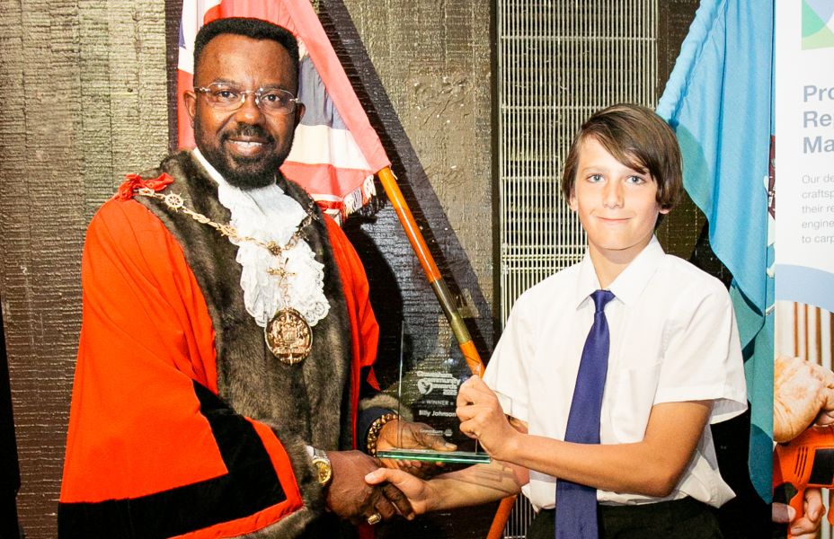 Imago young carer receives glass award from Cllr Daniel Adewale King, Mayor of Gravesham.
