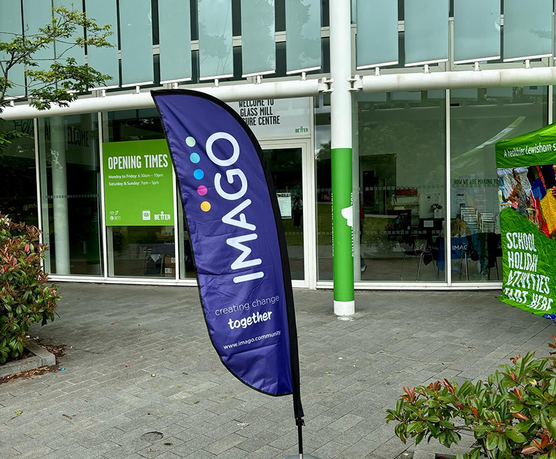Photo of an Imago branded flag outside Glass Mill Leisure Centre in Lewisham